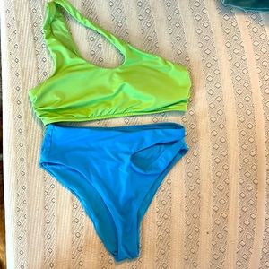 Bright and bold VS swim suit! Top is Medium. Bottom is Small. Super comfy.